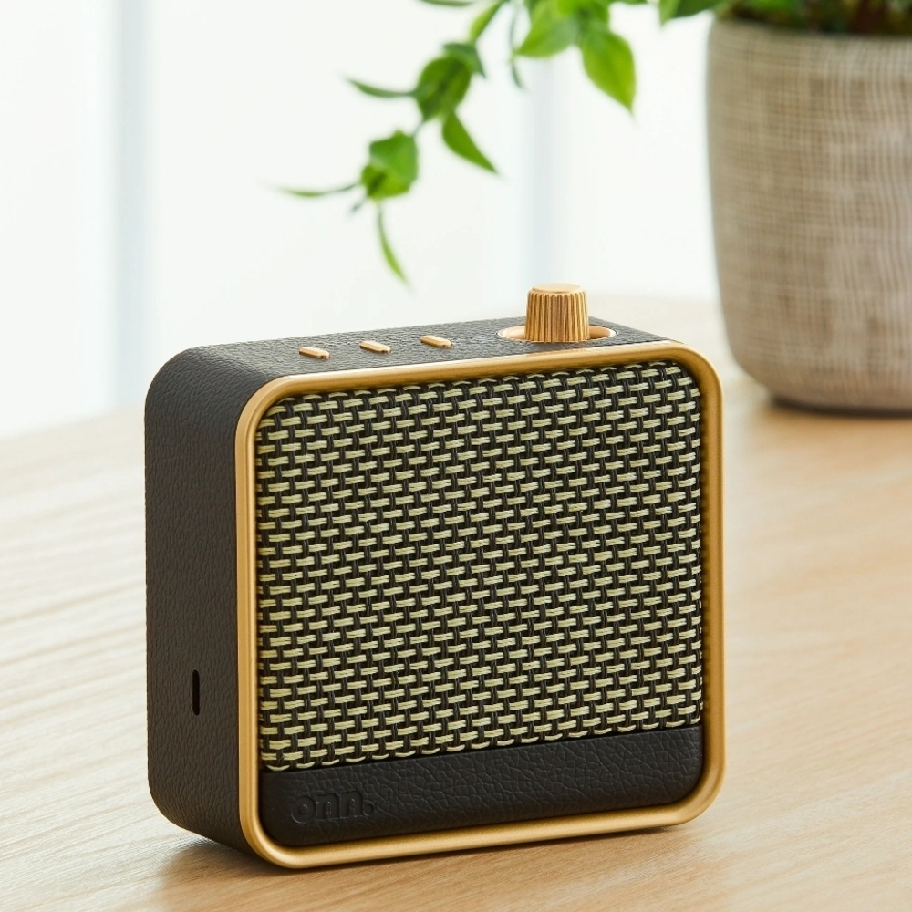 On Running Black and Gold Portable Speaker with Elegant Design